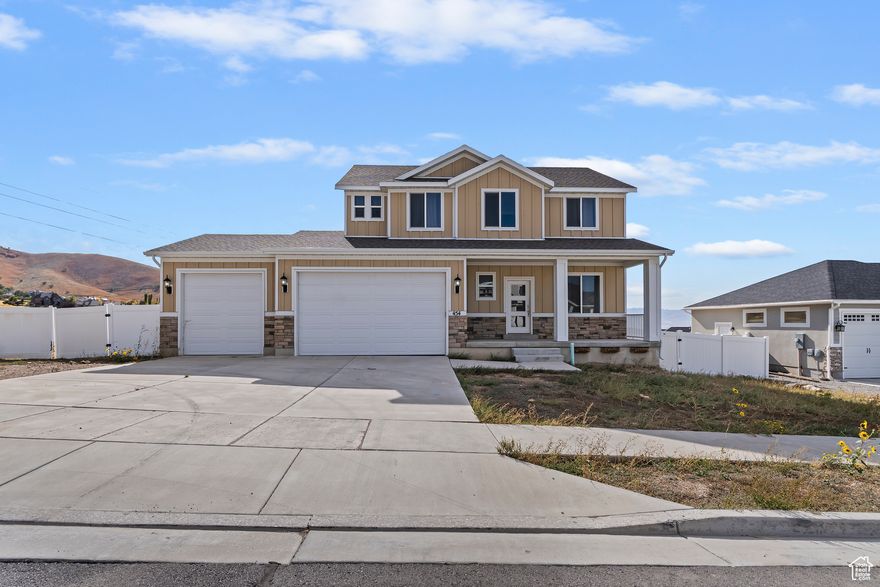 Perched above the beautiful Tooele Valley, this stunning home offers panoramic views from nearly every window. Whether relaxing on the front porch with mountain vistas or enjoying the open backyard with sweeping valley views, this property captures the very best of Utah living. Conveniently located just minutes from shopping and dining, yet within walking, riding, or ATV distance to mountain trails, this home provides both accessibility and adventure. With its unique blend of city convenience and outdoor recreation, it truly offers the best of both worlds. Showings will begin following the Property Preview on Saturday.