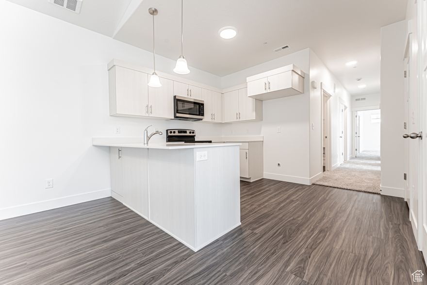 Take pride in your new condo at Mountain Ridge, boasting 9-foot ceilings, generous storage, and stunning finishes throughout. Enjoy top-tier amenities including clubhouses, a fully equipped gym, community pools, parks and pickleball courts, among others! Plus, you'll have quick and easy access to both Mountain View Corridor and Bangerter Highway. Discover all this exceptional community has to offer. Reach out today for more information or to set up a visit to the community.