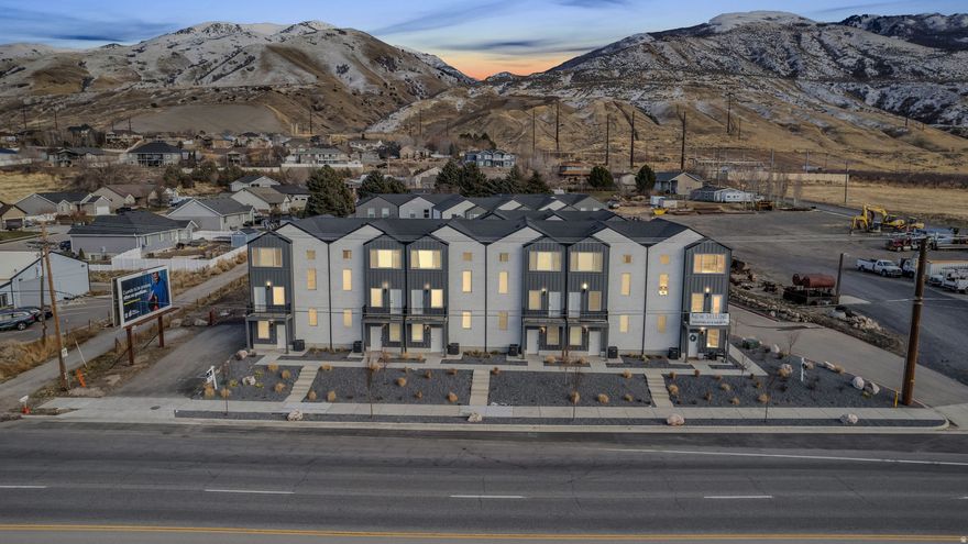 Check out this beautiful three-story townhome! The open kitchen features gorgeous granite countertops and custom soft-close cabinets, perfect for cooking or entertaining. Enjoy your morning coffee on the private balcony or unwind after a long day. The primary suite has everything you need, with a spacious walk-in closet, tile-surround shower, and dual-sink vanity. Plus, the two-car garage with a mudroom entry makes life a little easier. This home qualifies for a 20k new construction grant.