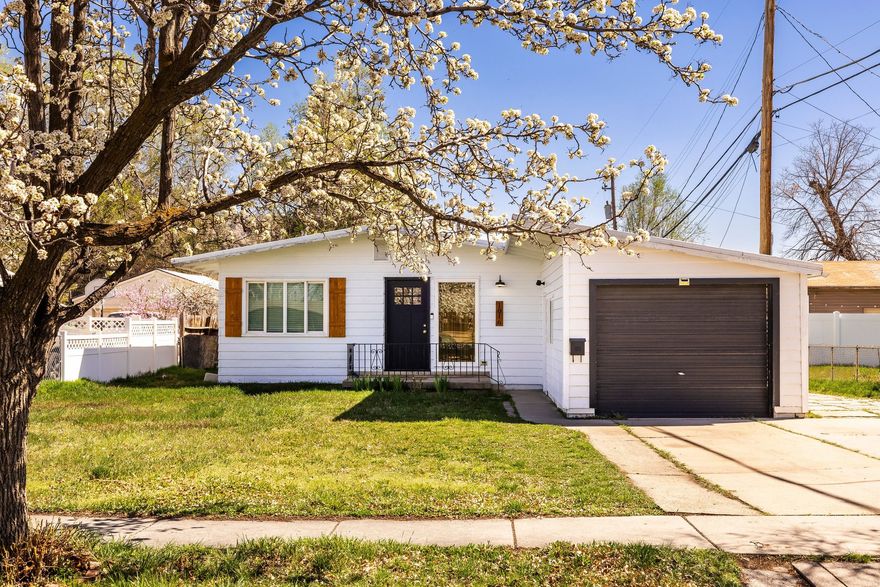 Home qualifies for community reinvestment act loan. 3% down, no mortgage insurance to the buyer and no max income cap. Beautiful mid-century modern rambler located in North Rose Park! This cool and sophisticated home is the perfect starter home or ideal for anyone looking for true single-level living. The attached one-car garage adds everyday convenience and long-term value. The updated kitchen features a tapas-style counter-perfect for casual dining, entertaining, or gathering with guests. Abundant natural light fills the home, creating a warm and inviting atmosphere throughout. With all square footage on one level, the layout offers both comfort and functionality. Pride of ownership shines with thoughtful upgrades completed within the past three years, including luxury vinyl flooring, kitchen improvements, a new water heater, and a new sewer liner. Ideally located for convenience and lifestyle, this home offers quick access to Salt Lake International Airport, downtown SLC nightlife, dining, and sporting events-making it a commuter's paradise.