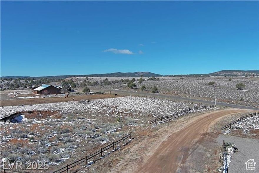 Tucked in a quiet cul-de-sac off Old Hwy 89, this 1.27-acre lot in Bryce Gate offers the perfect blend of seclusion & access. Fully fenced with a wood perimeter, community well (1/4 acre ft water included), & power stubbed to the lot, it's ready for your dream build whether a nightly rental or single-family home. Join a growing vacation hot spot with 4 neighboring homes already hosting rentals. Ideally situated between Zion & Bryce Canyon, & minutes from Grand Staircase-Escalante, Coral Pink Sand Dunes, & charming historic towns. A prime base-camp for outdoor adventure, investment, or both!