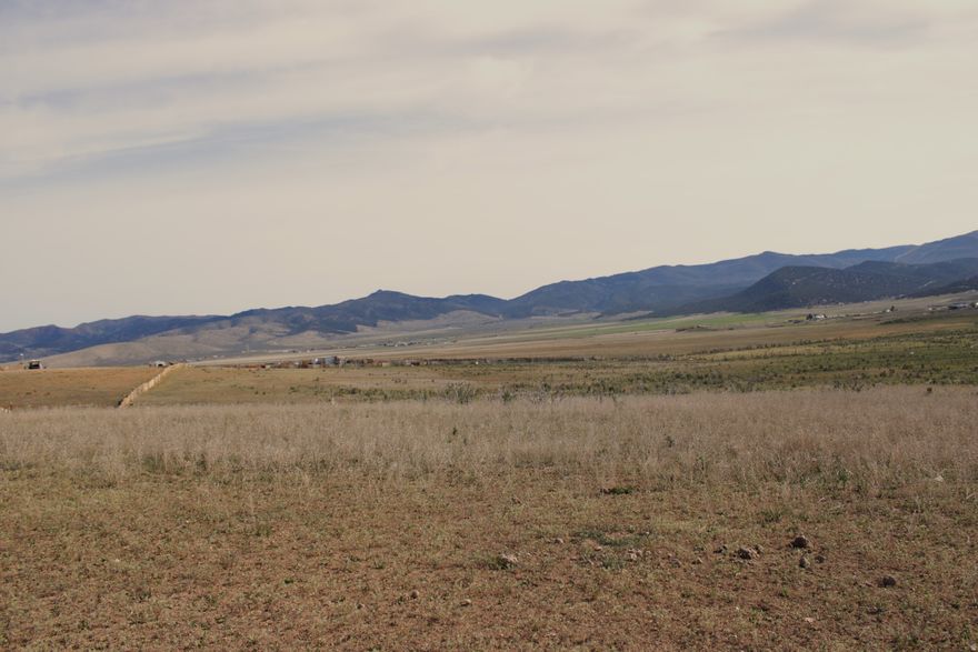 *Seller Financing Available!  Parcel #26 in the Elk Meadows subdivision offers a great opportunity to own a piece of scenic land in the peaceful surroundings of Indianola. Accessible via a dirt and gravel road, this agricultural parcel provides a sense of seclusion while still being within reach of nearby amenities. A neighboring fence lines the west side of the property.  Power lines run overhead, adding convenience for future development.  The property features beautiful views of the surrounding valley and mountains. With its natural landscape and open space, Parcel #26 is a great place to bring your vision to life and enjoy the quiet charm of rural living.