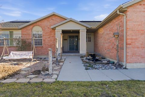 Photo of 9327 S UINTA HILLS DR, West Jordan, UT 84088 (MLS # 2135137)