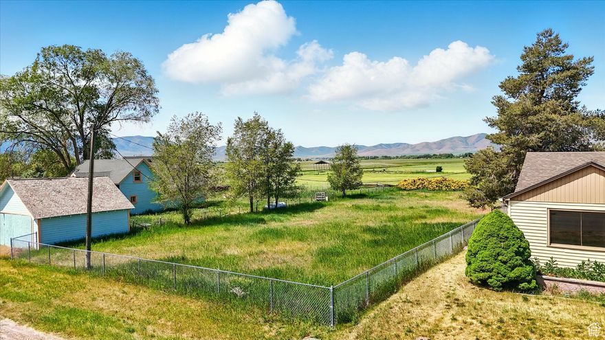 Seize the opportunity to build your dream home on this 0.32-acre lot in the heart of Malad! Perfectly situated in a charming small town, this centrally located parcel offers breathtaking views of the western mountains, providing a stunning backdrop for your future residence. With its prime location, you'll enjoy easy access to local amenities, shops while savoring the tranquility of small-town living. This lot is a gem for anyone craving a quiet retreat without sacrificing convenience. Don't let this opportunity slip away to design a home that's uniquely yours!