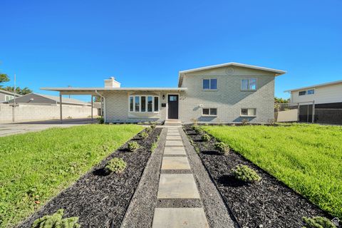 Photo of 1998 W THECKSTON RD, Taylorsville, UT 84129 (MLS # 2113896)