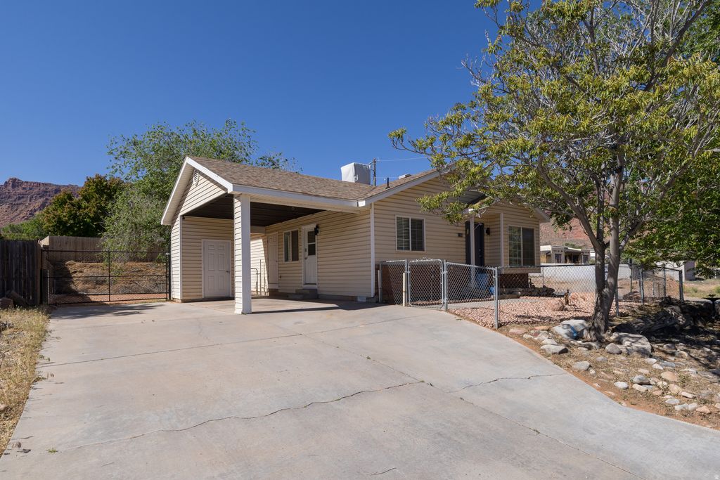 Photo of 1108 E HOLYOAK LN, Moab, UT 84532 (MLS # 2156718)