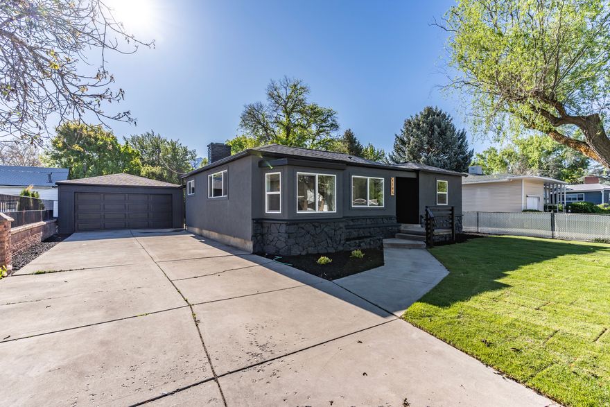 Come and see this beautifully updated home in the heart of Millcreek featuring an open and inviting layout perfect for modern living and entertaining. The home showcases custom cabinets paired with elegant quartz countertops, creating a stylish and functional kitchen space. Enjoy the fresh feel of new flooring throughout, along with new windows that bring in abundant natural light. The exterior has been upgraded with new stucco for great curb appeal, while the remodeled bathrooms add a touch of luxury and comfort. Step outside to a beautifully landscaped yard complete with new grass and a sprinkler system, making it easy to maintain and enjoy year-round. This move-in-ready property combines quality upgrades, charm, and convenience in a fantastic location. Furnace 2025, Water heater 2025, New appliances.