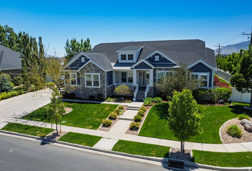 Grand Executive home in desirable Lehi neighborhood, ideal location. Home boasts all the upgrades and finishes. With high vaulted ceilings and open floor plan, home has a great feel and flow.  Huge family room opens to beautiful high end kitchen ideal for entertaining. Master suite is spacious and elegant, large bathroom and walk in.  Bedrooms are all large up and down.  Main level living at its finest.  Basement is nicely finished with professional touches.  Oversized bedrooms and bathroom.  Family room is great for entertaining and relaxation.  Property is huge half acre.