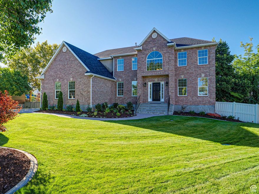 This stunning 7-bedroom, 4-bath home sits at the end of a quiet cul-de-sac in Draper and makes an immediate impression with its incredible curb appeal. Step inside the two-story entryway with gleaming hardwood floors and discover a thoughtfully updated interior. Recent upgrades include fresh paint, new carpet, modern lighting, updated windows and blinds, new garage doors with opener, a water heater, upstairs AC unit, a new roof, beautifully renovated bathrooms, and more. To the left, French doors open to a private office or den with a custom shiplap accent wall. To the right, a bright formal living room flows into the formal dining room, enhanced by a tray ceiling and large windows. The chef's kitchen is a showstopper with granite countertops, some new appliances, an island, double ovens, abundant cabinetry, a built-in pantry, and a sunny dining nook with direct deck access. Just beyond, the great room boasts expansive windows and a fireplace for effortless gatherings. A stylish powder room completes the main level. Upstairs, the primary suite impresses with vaulted ceilings, a sitting area, a walk-in closet, and a newly remodeled spa-like en-suite bathroom with dual sinks, a freestanding tub, glass shower, linen closet, and private water closet. Three additional bedrooms-one connected by a Jack & Jill bath-plus another renovated full bath and a well-appointed laundry room complete the upper level.  The walk-out basement expands your living space with a massive family room, three bedrooms with double closets, a  bathroom, and a huge storage room with built-in shelving. With its private entrance, it's ideal for multigenerational living, a guest retreat, or even potential rental income. Outside, enjoy a fully fenced backyard with pristine landscaping, in-ground trampoline, sport court, second-story deck, and a sunken terrace with an outdoor fireplace. Additional highlights include a cold storage, and a 3-car garage. All this, just minutes steps away from Pheasant Meadow Park, Smith Fields Park, Harmons, Corner Canyon High School, restaurants, and the Draper Farmers Market. Don't miss this rare opportunity to own a beautifully updated, versatile home in one of Draper's most sought-after neighborhoods. The seller is willing to entertain any and all requests in an offer AGENTS - READ AGENT REMARKS