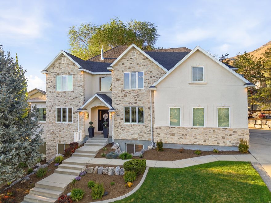 Creekside at Aspen Grove is a gated, 33-home community around a private 4-acre park. This cul-de-sac home has updated interior and exterior features: remodeled kitchen and baths, new carpet, and new garage doors. In 2020, two high-efficiency HVAC units and a tankless water heater were installed; exterior refreshed Jan 2026. The basement is versatile: usable as a separate living space with a two-bedroom apartment option or integrated with the main level; includes a large storage room and a dance/workout area.  The shaded backyard has mature trees and direct back-yard access to the Murdock Canal with 20+ miles of trails for walking, running, and biking. Manila Pond outside the gate offers walking, a sandy beach, canoeing/kayaking, fishing, pavilion, and fish cleaning station. RV parking.  Seller contributes $25k toward closing costs with a full-price offer.