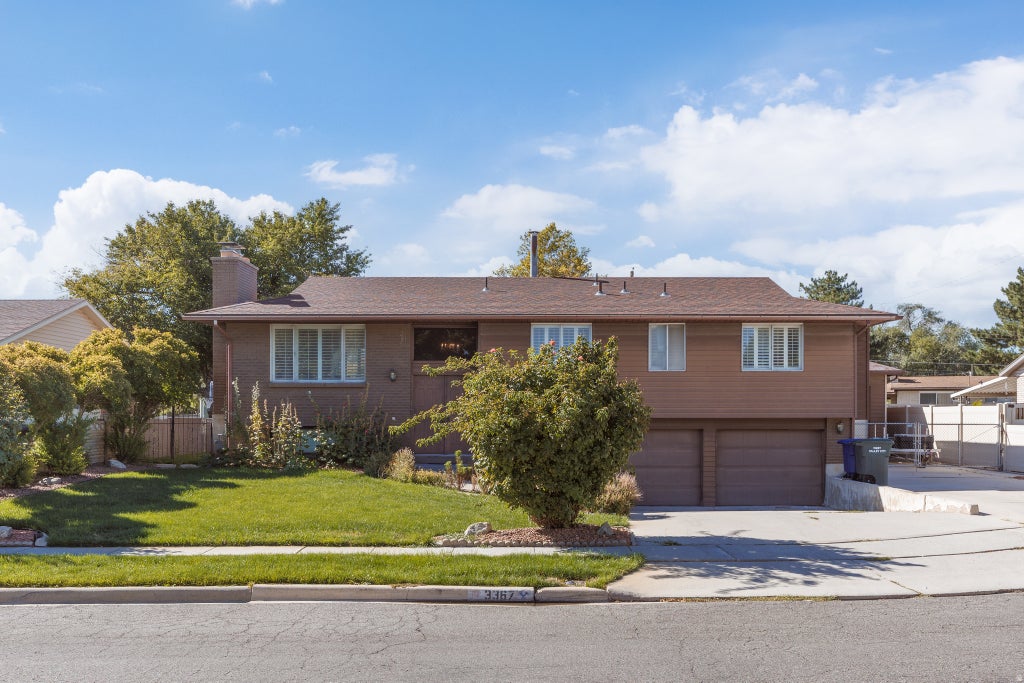 Photo of 3367 W BLUE HAVEN DR, West Valley City, UT 84119 (MLS # 2186093)