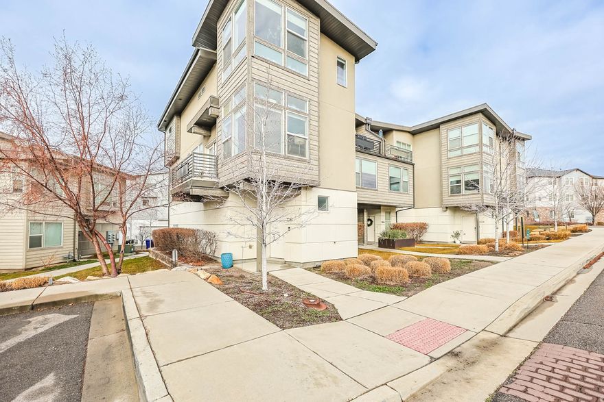 Modern 3-Story Townhome with 2-Car Garage, Pool & Gym Access Welcome home to this beautifully maintained 3-story townhome located at 1010 W Rooftop Dr., Midvale, UT 84047. Offering 1,627 sq ft, 2 bedrooms, and 2.5 bathrooms, this home combines modern style, convenience, and access to great amenities. The open-concept main level features a bright kitchen with all appliances included, ample cabinet space, and a seamless flow into the dining and living areas-perfect for everyday living and entertaining. Large windows throughout provide abundant natural light and highlight the contemporary finishes. Upstairs, both bedrooms are generously sized and each includes its own bathroom, offering privacy and convenience. The primary suite features excellent closet space and a private en-suite bath. Additional highlights include central air, in-unit laundry, and an attached 2-car garage for secure parking and additional storage. As an added bonus, tenants enjoy access to the gym and pool located at the neighboring Lofts Apartments, offering the perks of community amenities while enjoying the privacy of a townhome. Conveniently located just minutes from freeway access, shopping, dining, and nearby parks-this home offers an easy commute and low-maintenance living.  Property Details:  2 Bedrooms / 2.5 Bathrooms  1,627 Sq Ft  3-Story Townhome  Attached 2-Car Garage  Access to pool & gym at neighboring Lofts Apartments  All appliances included  No pets  No smoking  12-month minimum lease  Modern, well-located, and amenity-rich-this townhome is ready for its next tenant.