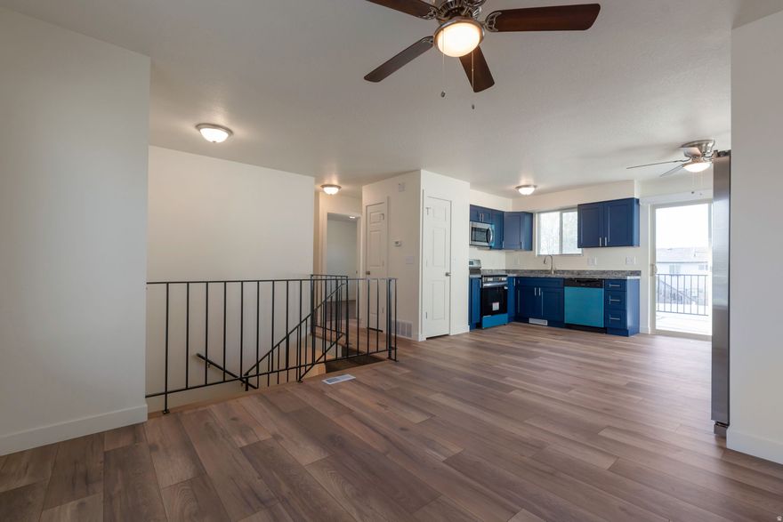 Completely rebuilt from the ground up, this home offers the best of both worlds-brand-new construction in an established neighborhood. Enjoy the character of a mature area with the confidence and comfort of modern updates throughout.  Designed for true peace of mind, this home features a new roof, central A/C, furnace, water heater, electrical, and plumbing systems. Inside, you'll find stylish LVP flooring, all-new kitchen and bathroom cabinetry, and a full suite of brand-new appliances. Every detail has been thoughtfully updated, including all new windows, New exterior maintenance free, a new garage door with opener, and a spacious Trex deck perfect for outdoor living.  The interior showcases fun, on-trend colors that create a warm and inviting atmosphere for today's buyers.  This is truly a move-in ready home-nothing left to do but bring your belongings and start enjoying homeownership. Home is not a flip.