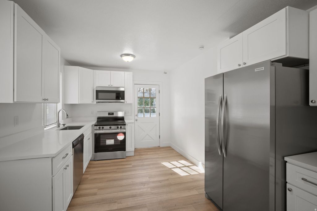 Photo of 8558 S CENTER ST, Sandy, UT 84070 (MLS # 2139078)