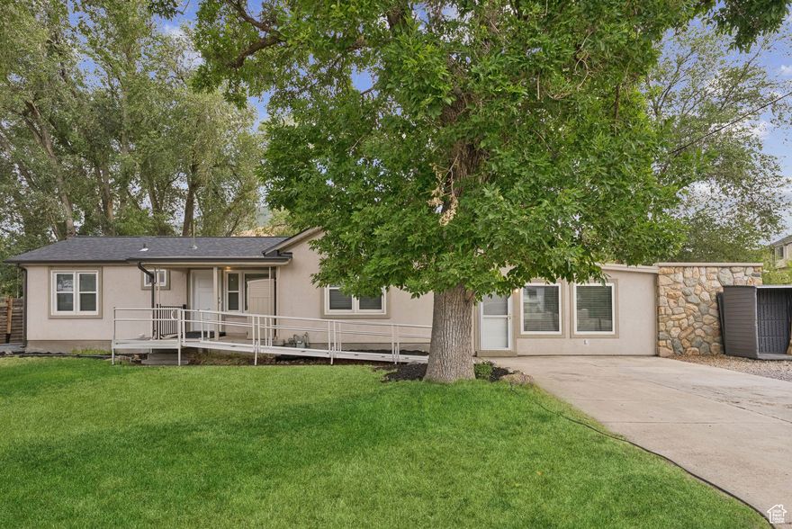 Discover this charming single-level home featuring brand new flooring and fresh paint throughout. Situated on a .38-acre lot, it offers ample outdoor space and convenience. Ideally located near Draper Park, with easy access to many trails, including the Porter Rockwell Trail and Draper Canal Trail right behind the property. Perfect for outdoor enthusiasts and those seeking a move-in-ready home in a fantastic location! Please note: The side and back yard are not landscaped, and photos are intended to show inspiration of what it could look like when finished. Square footage figures are provided as a courtesy estimate only and were obtained from an appraisal. Buyer is advised to obtain an independent measurement.