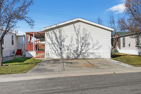 Photo of 3676 S WILLOW RIVER RD RD W #17, West Valley City, UT 84119 (MLS # 2142138)