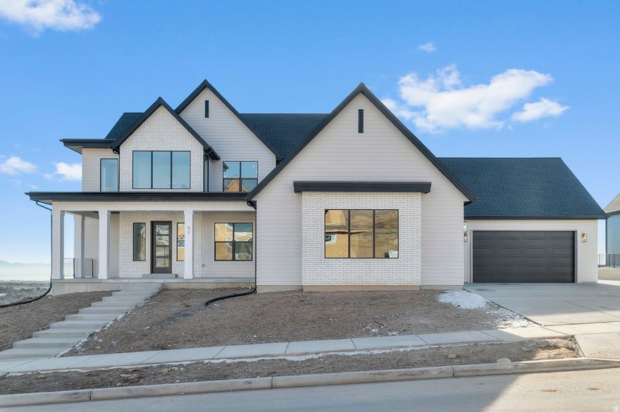 This Elgin is to die for! It will take your breath away from the moment you walk in the front door with the soaring ceiling, oversized windows and effortless stairs. Located on the foothills in East Lehi in the best new community close to highway access, schools, restaurants, the Silicon Slopes and the mountains! Gorgeous home with high end, Emerald Elite finishes selected by our award-winning parade of homes designer. Finishes include quartzite countertops, custom cabinetry, JenAir appliances, full euro shower glass and so much more. Ask me about our generous home warranties, active radon mitigation system and Smart Home package which are all included in this home. $25,000 to buy down your rate using our preferred lender. Actual home may differ in color/material/options. Pictures are of finished homes of the same floor plan and may contain options/upgrades/ decorations/ furnishings not available at the advertised price. No representation or warranties are made regarding school districts and assignments; conduct your own investigation regarding current/future school boundaries. Buyer to verify all information. Sales office hours are Monday, Tuesday, Thursday, Friday, and Saturday from 11:00am-6:00pm. Wednesday from 1:00pm-6:00pm.