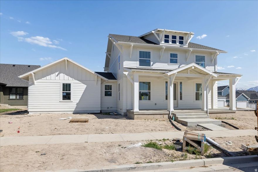 Welcome to The Arlington Craftsman, a beautifully designed home featuring an open concept kitchen, breakfast nook, and great room, perfect for modern living. Enjoy the luxury of a vaulted primary suite with separate vanities, a free-standing tub, a walk-in shower, and a huge closet. The layout includes two flex spaces off the entry and a mostly finished basement with two bedrooms, one bathroom, and potential for additional living space. The 4-car tandem garage gives ample storage space for toys and vehicles.  Completion estimated for April 2026.