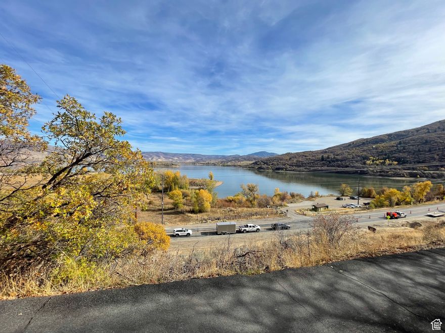 This incredible east-facing slope homesite is located minutes away from Powder Mountain and is sited perfectly to have a view of Pineview Reservoir, which no one has. Minutes from the ski resorts, across the lake, and trails within walking distance give you multiple options for activities year-round. The site is ideal for skiing, both Lefty's Canyon, while also overlooking the majestic Pineview Reservoir. Lake and mountain biking trails offer a rich summer resort experience. The winter months provide a paradise of untouched powder on one of the largest ski resorts in North America. This homesite can accommodate your dream home. The parcel is set minutes away from Snowbasin Resort, the heart of the future Club Med, Powder Mountain village, eventually home to a collection of Main Street-style shops and other amenities. Building your dream ski resort property is as simple as ever, giving you the options of bringing your own team or working with the existing architects to create your ideal vision. THERE ARE POWER LINES RUNNING THROUGH THE LOT. All information is to be reliable but not guaranteed. Buyer and buyer agent to verify all information