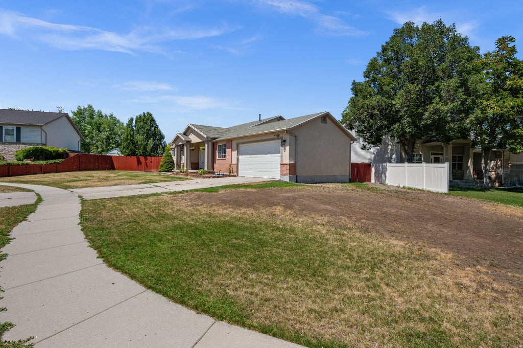 Photo of 9288 S BINGHAM HILLS CT, West Jordan, UT 84088 (MLS # 2171384)