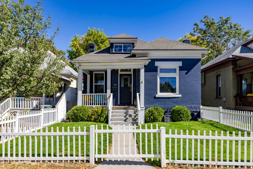 Charming historic cottage located in the coveted area of Downtown Salt Lake City. Walking distance to several restaurants, shops and coffee shops at the 9th and 9th district. Recently remodeled with updated kitchen and bathrooms while maintaining original character. Inviting covered front porch and private backyard with patio featuring modern concrete square design-perfect for outdoor living. Kitchen includes quartz countertops, white cabinetry, and stainless steel appliances. One bathroom features marble countertops, double vanity, and freestanding soaking tub. Original wood floors throughout add to the home's historic charm. The second bathroom has quartz countertops new vanity and tile.
