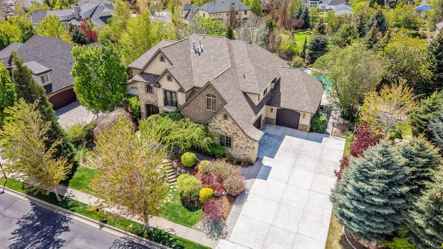 Live the Highland Lifestyle You've Been Waiting For! Opportunities like this are rare in one of Highland's most sought-after neighborhoods where luxury, convenience, and outdoor living come together effortlessly. This location isn't just beautiful it's active. Just steps from your front door, you'll find everything you need to enjoy the Utah lifestyle to its fullest: nearby parks, a basketball court, soccer fields, disc golf, and an extensive network of walking, hiking, and mountain biking trails. Whether it's morning walks, weekend games, or evening rides, this home makes it easy to stay connected, social, and outdoors. Inside, this custom-built home has been meticulously maintained and thoughtfully upgraded, offering true pride of ownership and peace of mind. The open-concept layout, soaring vaulted ceilings, and expansive windows fill the home with natural light while showcasing your private backyard retreat. A stunning rock fireplace anchors the spacious family room perfect for gathering and unwinding. Enjoy an elevated living experience with a built-in surround sound system extending through the deck, kitchen, great room, primary bathroom, and office creating the perfect atmosphere whether you're entertaining guests or enjoying quiet moments at home. The chef's kitchen is designed to elevate both daily living and entertaining, featuring double ovens, stainless steel appliances, granite countertops, and custom cabinetry. Your primary suite offers a true escape, complete with a spacious walk-in closet, cozy fireplace, spa-like ensuite with a jetted tub and walk in shower all for your own private retreat at the end of the day. The walkout basement expands your possibilities with a full second kitchen, large family room, theater room, exercise space, and flexible rooms to fit your lifestyle whether hosting, working, or relaxing. Step outside to your backyard oasis designed for both fun and effortless entertaining. Enjoy evenings around the fire pit, a built-in underground trampoline for added recreation, and a gas line on the deck for seamless BBQs without the hassle of propane. The heated saltwater pool with slide, automatic cover, and robotic cleaner creates a truly low-maintenance, resort-style experience right at home. Beyond the visible upgrades, this home is equipped with high-efficiency, comfort-focused systems that enhance everyday living featuring two furnaces for balanced climate control, a humidifier for year-round air quality, a tankless water heater for endless hot water, and a water softener for added comfort and longevity of fixtures. These behind-the-scenes improvements provide both convenience and long-term value. An oversized, extra-deep four-car garage ensures you have room for everything vehicles, gear, and all the extras that come with an active lifestyle. For added convenience, all furniture is negotiable offering a turnkey, move-in-ready opportunity if desired. This is more than a home it's a rare combination of location, lifestyle, upgrades, and condition in a market where homes like this are hard to find. Schedule your private showing today and experience it for yourself. All information deemed reliable but not guaranteed. Buyer to verify all information, including square footage and acreage, to their satisfaction.