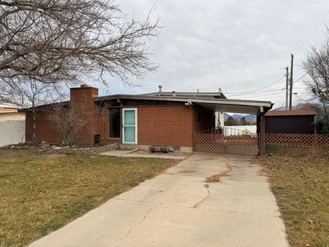 Photo of 3951 S SOUTHBOURNE WAY W, West Valley City, UT 84119 (MLS # 2128001)