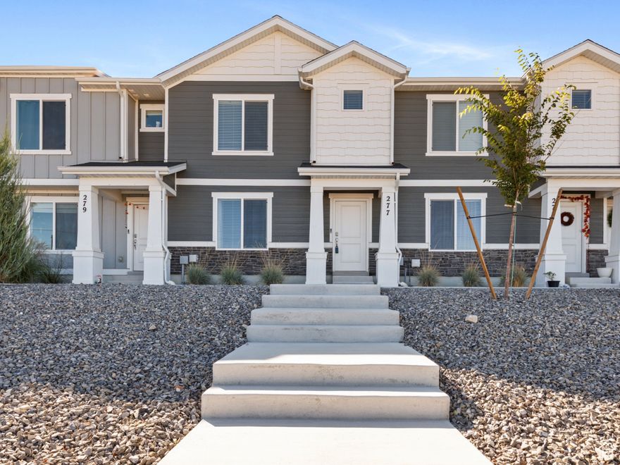 **Charming North Tooele Townhome  Only 2 Years Old!** Welcome home to this modern, low-maintenance townhome located in a desirable North Tooele community, just minutes from SR-36. Thoughtfully designed with comfort and convenience in mind, this home features: **Inviting front porch** and xeriscaped landscaping for easy upkeep. * **Open floor plan** perfect for entertaining and everyday living. **Primary suite** with private bath for your own retreat. **Smart home upgrades** including a doorbell camera, smart hub, and garage door opener (with options to expand security features). **Abundant storage** thanks to a spacious crawl space with 7-foot ceilings. **Two-car garage** with rear access for convenience and curb appeal.  **Community amenities** such as walking paths and well-maintained common areas. This nearly new home offers the perfect blend of style, function, and low-maintenance living.