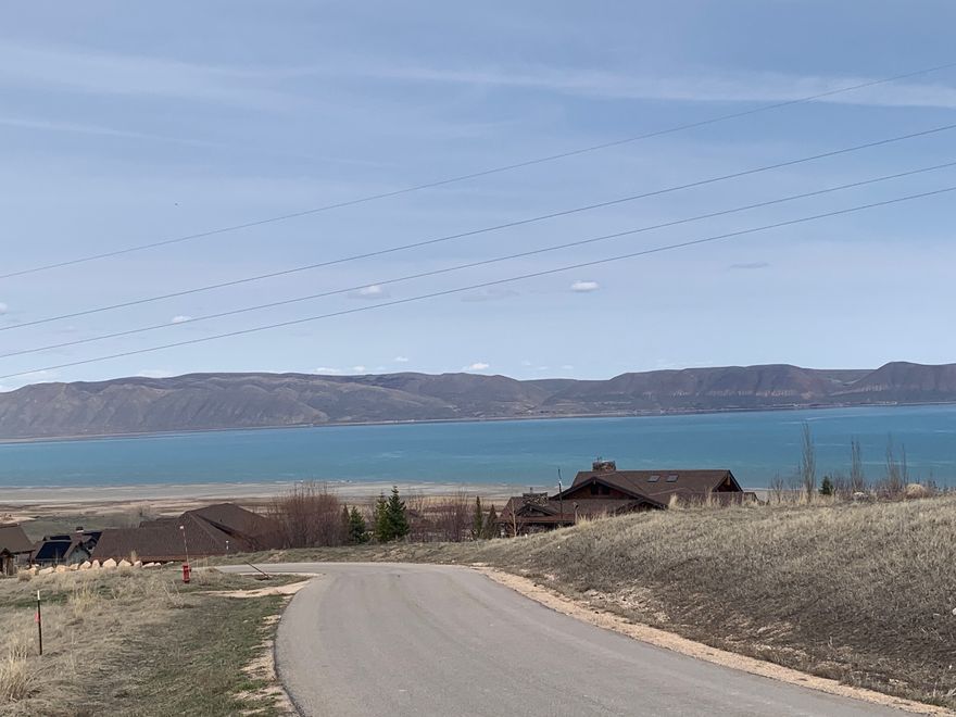 Incredible view lot located in The Reserve at Bear Lake, a premier paved and gated community overlooking the turquoise waters of Bear Lake. This exceptional property offers the perfect setting for your dream home, surrounded by stunning mountain and lake views. As an owner in The Reserve, you'll enjoy world-class amenities including two heated seasonal pools, a year-round hot tub, a beautiful clubhouse with meeting rooms, game room, and fitness center, as well as a poolside pavilion, splash pad, multi-use sports court, playground, and gated beach access to Bear Lake. Outdoor enthusiasts will love the direct access to Fish Haven Canyon, offering hundreds of miles of trails for UTV and ATV riding, snowmobiling, mountain biking, hiking, and snowshoeing. This lot combines breathtaking views, recreation, and resort-style living in one of Bear Lake's most sought-after communities. Short term rentals allowed.