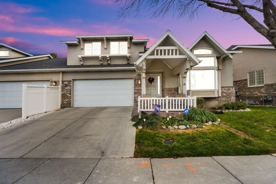 Beautiful turn-key home in a prestigious gated community in the heart of the Salt Lake Valley. Bright and inviting with abundant natural light and skylights. Main-level primary suite features vaulted ceilings, a walk-in closet, and a private bath with dual vanities, jetted tub, and separate shower. Fully finished basement includes a complete mother-in-law suite with kitchen, laundry, living room, 2 bedrooms, and private entrance. Enjoy the security and exclusivity of gated living plus a private attached 2-car garage. Move-in ready and centrally located near shopping, dining, and major commuter routes.