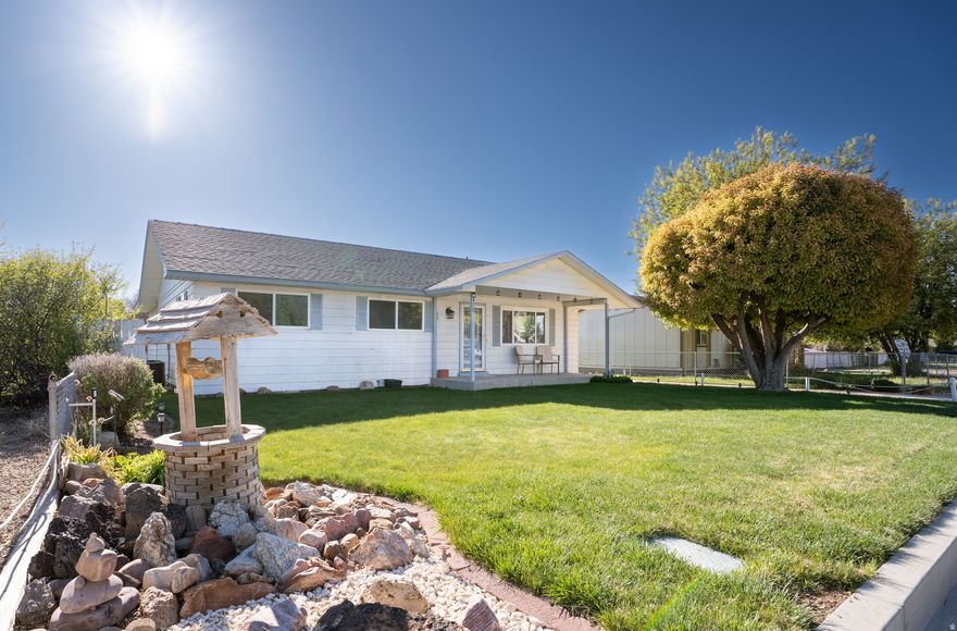 Charming and move-in ready, this 3-bedroom, 2-bath home sits on a manageable 0.14-acre lot. Inside, Beautifully updated and move-in ready. Inside, you'll find brand-new flooring throughout and fresh paint in every room, creating a clean, modern feel. The fully remodeled kitchen shines with new cabinet doors and drawer fronts, soft-close hinges, stylish new hardware, and upper cabinets featuring glass accents. New faucets have been installed throughout the home, adding both function and style. Both bathrooms have been tastefully refreshed with black-painted vanities, elegant gold hardware, new tile in the guest bath, updated black fixtures, and floating shelves for a contemporary touch. Additional upgrades include all new, upgraded lighting fixtures, freshly painted vent covers to match the flooring, and new tile in the mudroom and laundry room. Comfort has been enhanced with the addition of central air, along with a new air/heat vent in the master bathroom. A new window in the front entry room on the south wall brings in extra natural light, making the space feel even more inviting. A turnkey opportunity for easy living-just bring your furniture and settle in.    Square footage figures are provided as a courtesy estimate only and were obtained from the Seller.  Buyer is advised to obtain an independent measurement.