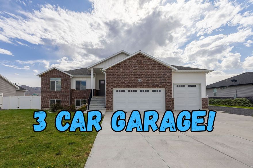 Welcome to your dream home in one of Tremonton's newer subdivisions! This beautifully maintained rambler is only a few years old and offers the perfect blend of modern comfort and thoughtful design. With 6 bedrooms, 3 bathrooms, and a fully finished open floor plan, there's plenty of room for family, guests, or a home office setup. You'll love the warm grey tones used throughout the home, creating a cozy, inviting atmosphere. The spacious kitchen and living area flow seamlessly together-ideal for entertaining or spending time together. Step outside to enjoy the double-tiered step-down firepit, perfect for relaxing under the stars, and soak your worries away in the included hot tub. The large backyard is ready for gatherings or quiet evenings at home. Don't miss the extra high 3 car garage with extra space for storage or hobbies, and just to finish it off,  Utopia Fiber is paid for outright so you won't pay a connection fee ever! Just choose your preferred internet provider. Homes like this don't come up often-schedule a tour today and see why this one stands out!