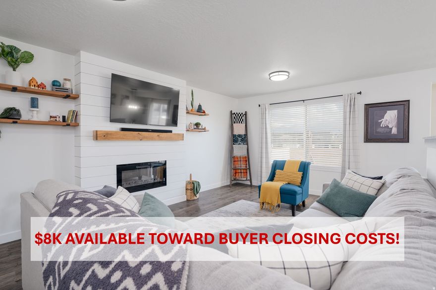 **$8K AVAILABLE TOWARD INTEREST RATE BUYDOWN OR BUYER CLOSING COSTS** In addition, experience the gift of $25K in price reductions by making this YOUR HOME FOR THE HOLIDAYS! Combining the perfect environment of convenience with the beauty of attentive craftsmanship, this stunning home is the embodiment of your home ownership dreams. From the welcoming farmhouse exterior to the abundance of natural light inside, you will experience the ideal in home design, comfort, and a feeling of being right at home. Design selections have been carefully considered and integrated as part of this immaculate home. Come in and gather in the family room and snuggle up to the cozy fireplace or relax and unwind to a book or movie in the spacious basement. The FULLY COMPLETED BASEMENT offers flexible options with the versatility of serving as a family room, an office or even a fourth bedroom--you choose what works for you. Perfectly situated in a neighborhood that offers a community pool, a community park, a brand new splash pad and quick access to the nearby Patriot Park and Jordan River Trail, you will experience a quality of life at its finest. BRAND NEW PUBLIC LIBRARY is within walking distance and will open in January 2026. REFRIGERATOR INCLUDED. Square footage figures are provided as a courtesy estimate only and were obtained from prior appraisal. Buyer is advised to obtain an independent measurement.