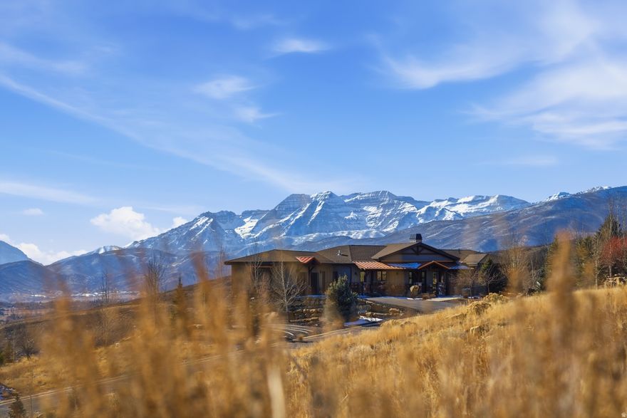 Discover the perfect canvas for your dream mountain home on this rare 1acre uphill lot overlooking the Provo River, Deer Creek Reservoir, and the sweeping beauty of Heber Valley. Elevated terrain provides natural privacy and stunning panoramic views in every direction. Located just 10 minutes from the new Deer Valley East Village and 45 minutes from Salt Lake International Airport, this homesite offers unmatched access to worldclass skiing and effortless travel. Spend your mornings fly fishing on the Provo River-just a short walk from your doorstep-and your afternoons exploring abundant hiking and mountainbiking trails that wind through the surrounding hills. Whether you're envisioning a yearround residence or a mountain retreat, this property delivers the ideal blend of scenery, recreation, and convenience.