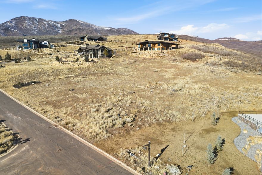 Discover the perfect canvas for your dream mountain home on this rare 1acre uphill lot overlooking the Provo River, Deer Creek Reservoir, and the sweeping beauty of Heber Valley. Elevated terrain provides natural privacy and stunning panoramic views in every direction. Located just 10 minutes from the new Deer Valley East Village and 45 minutes from Salt Lake International Airport, this homesite offers unmatched access to worldclass skiing and effortless travel. Spend your mornings fly fishing on the Provo River-just a short walk from your doorstep-and your afternoons exploring abundant hiking and mountainbiking trails that wind through the surrounding hills. Whether you're envisioning a yearround residence or a mountain retreat, this property delivers the ideal blend of scenery, recreation, and convenience.