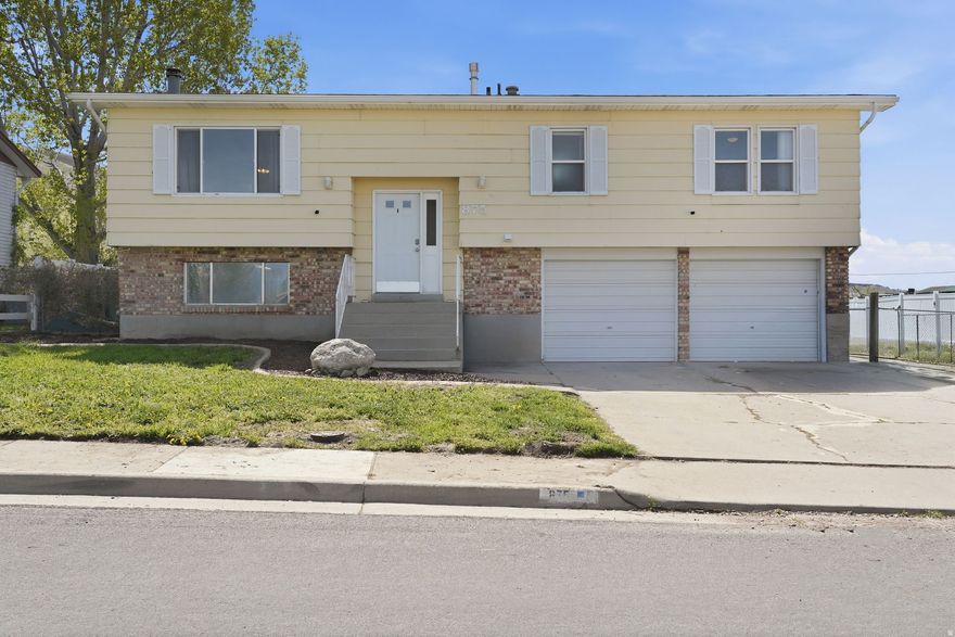 Set on a rare 0.55-acre lot, 875 W 1220 S offers the space, flexibility, and "finally-room-to-breathe" feel that's getting harder to find in Tooele. This 3-bedroom, 3-bath home features 1,886 square feet with a practical layout that works for just about anyone-whether you want extra room for a home office, hobby space, guests, or simply not living on top of each other. A garage adds everyday convenience, and outside you'll love the deck and patio-perfect for grilling, relaxing, and enjoying Utah sunsets. With no homeowners association and a generous yard ready for your ideas, this property is a great fit for buyers who want land, freedom, and long-term potential in a convenient location  Square footage figures are provided as a courtesy estimate only and were obtained from county.  Buyer is advised to obtain an independent measurement.