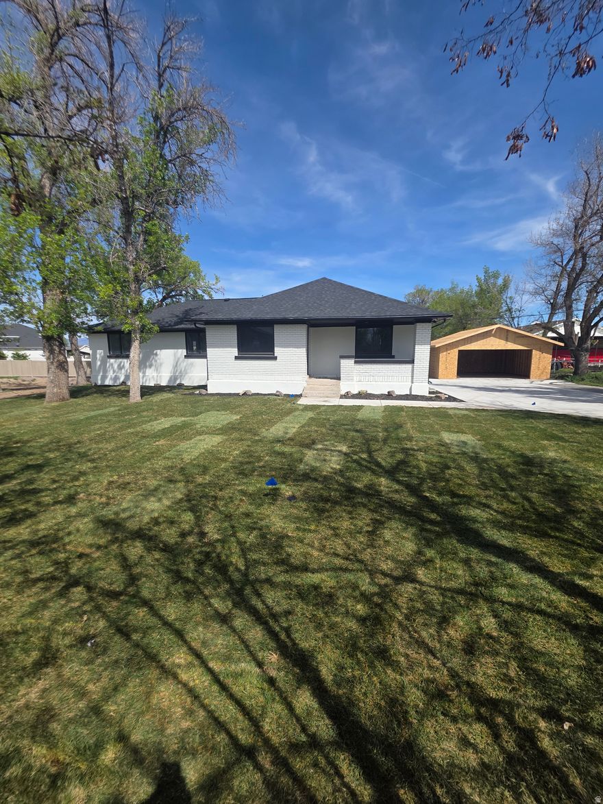Fully remodeled and move-in ready, this stunning 6-bedroom home sits on a rare half-acre lot in a highly desirable Riverton location. This home offers the feel of new construction with the benefit of space, privacy, and an established neighborhood.  The heart of the home is the beautifully updated kitchen featuring a HUGE quartz kitchen island, custom cabinetry, and stainless-steel appliances including a gas range, perfect for both everyday living and entertaining. The spacious layout offers multiple living areas, a fully finished basement, and flexible bedroom space ideal for a home office, gym, or guest rooms.  Downstairs, the finished basement includes a convenient kitchenette, providing excellent potential for multi-generational living or extended guest stays.  Beyond the cosmetic updates, major system upgrades have already been completed, including a new roof, new furnace and A/C, and a new water heater, offering peace of mind for years to come. The home also features all new flooring, cabinetry, and finishes throughout, along with beautifully updated bathrooms showcasing custom cabinets and tile showers.  The primary suite offers a private retreat with its own deck, perfect for relaxing and taking in the surrounding mountain views. A second deck provides additional space for outdoor living and entertaining.  A brand-new detached 2-car garage is being built and adds both function and value, with ample room for parking, storage, and toys. The oversized half-acre lot offers endless potential for outdoor living, RV parking, or future customization. Landscaping is a blank slate, ready for your personal vision.  Enjoy the perfect balance of space and convenience. Located just minutes from The District with shopping, dining, and entertainment, and quick access to Bangerter Highway for an easy commute. Nearby hospital and medical services provide added everyday convenience.  This is a rare opportunity to own a fully updated, turn-key beautiful home on land with no compromises. Square footage figures are provided as a courtesy estimate. Buyer to verify all.