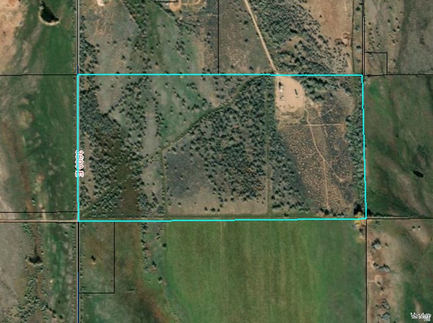 Desirable 80.14 Acres in Bennett. It has an aqueduct that runs through part of the property. It has one oil location on the northeast side. It includes road frontage access on the west side of the property. Good horse property with fencing. Would make a great potential home site with power close by. Great mountain views and privacy! Buyer will need to connect septic, propane, electricity, and water at own expense.