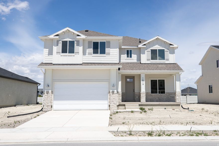 INTEREST RATES STARTING AS LOW AS 4.99% with our preferred lender or AMAZING $20,000 TOWARDS CLOSING COSTS, RATE BUYDOWN, OR PRICE REDUCTION REGARDLESS OF LENDER! (Talk to agent about details). Must-see Parkway Fields Community in Eagle Mountain! Move-in ready! This beautiful home built by Flagship Homes features 4 bedrooms, 2.5 bathrooms, quartz slab countertops, painted cabinets, laminate flooring on the main level, a large loft on the 2nd floor, landscaped front yard, 2 car garage, and backyard (can be landscaped for an additional charge). The backyard is bounded by a decorative concrete wall. The primary bedroom has a vaulted ceiling, large walk-in closet, and dual sinks with a separate tub/shower. With an unfinished basement, this home provides space for storage and room to grow. (If preferred, basement can be finished for an additional charge.) Call for more information or stop by our model home at 1546 E. Starling Lane, Eagle Mountain for a tour. Model home hours: Monday-Saturday 11 AM - 6 PM. Buyers to verify all information. Square footage is from house plans.