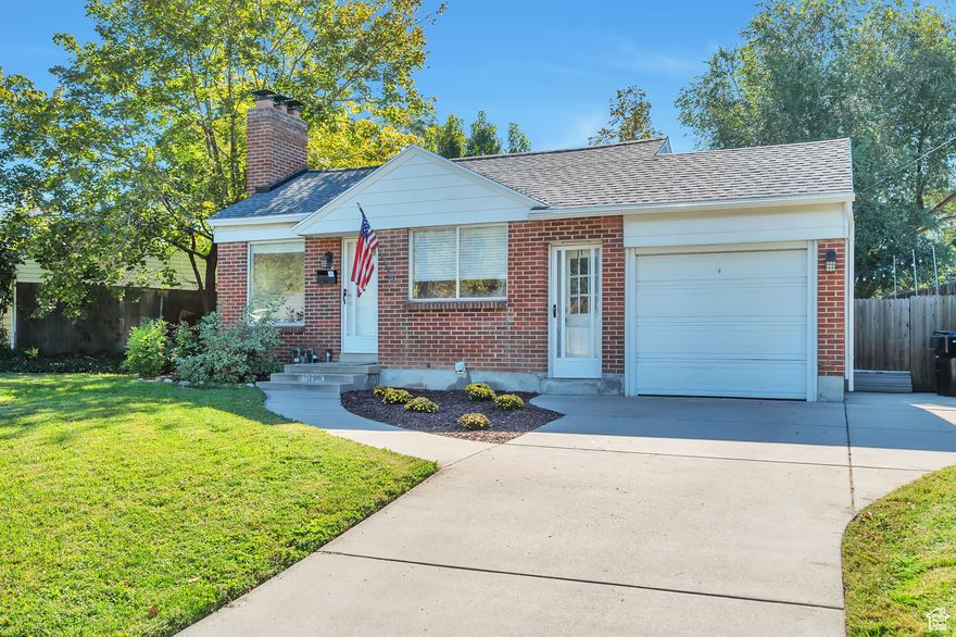 Discover the perfect balance of convenience and tranquility in this beautifully maintained Millcreek home. Just a short walk from Millcreek Commons, you'll love being steps away from year-round community events, outdoor ice and roller skating, dining, and local shops-while still enjoying the peace and quiet of a friendly, established neighborhood. Inside, the home features luxury vinyl plank flooring throughout the main level, creating a modern feel. The open-concept living, kitchen, and dining areas are filled with natural light, perfect for entertaining or relaxing with family. The kitchen boasts recently installed Taj Mahal stone countertops, new vinyl sliding doors and easy access to outdoor living. Energy-conscious buyers will appreciate the paid-for solar panels, keeping electric bills low month after month, as well as the recently replaced roof for added peace of mind. The basement offers a fun retro-style bar area (dry bar) and plenty of space for games or movie nights. Step outside to enjoy the pleasant, shaded backyard, or host BBQs on the deck surrounded by mature trees. Don't miss out on this home, come see it today.