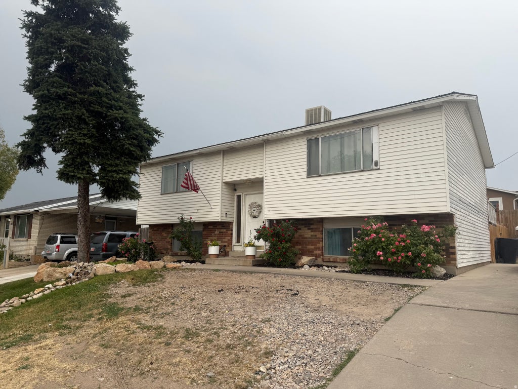 Photo of 5029 W 5400 S, Kearns, UT 84118 (MLS # 2167882)