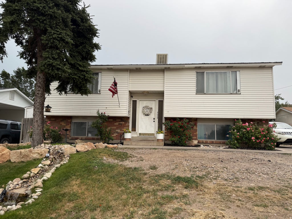 Photo of 5029 W 5400 S, Kearns, UT 84118 (MLS # 2167882)