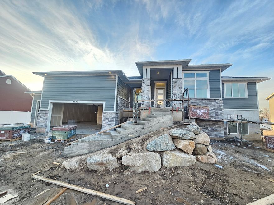 A modern prairie-style home designed for spacious living and timeless appeal. Featuring a large great room, big covered deck, and a giant garage, this home sits on a generous yard with room to relax. A finished basement completes five bedrooms and three-and-a-half baths. Over $17,000 in Lender incentives available.