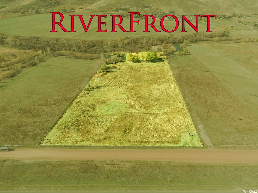 Private WEBER RIVER FISHING CAMPING HORSE PASTURE. Not much of that available. Four+ Acres close to Park City. Zoning allows one-family dwelling unit, mobile home with foundation, with traditional agricultural buildings, accessory buildings 2000 sf or less, with integrated solar energy system, wind power generation facility to 45 foot high. may operate a home occupation. Buyer responsible to verify all data.