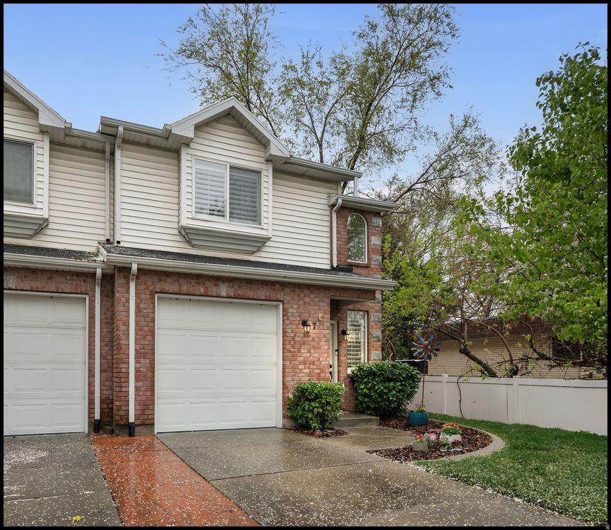 OPEN HOUSE NOON TO 1PM ON APRIL 11TH.  Don't miss this beautifully maintained end-unit townhome featuring three bedrooms and two and a half bathrooms in the heart of Bountiful! This home clearly reflects pride of ownership throughout. The main level offers an open-concept kitchen with solid surface countertops, recessed lighting, a breakfast bar/island, and fresh paint, flowing seamlessly into the adjoining living area. A convenient half bathroom for guests is also located on this level.  Just off the dining area, you'll find a fenced patio-perfect for outdoor furniture, and entertaining.  Upstairs includes a laundry area and three bedrooms, including a spacious primary suite with a private en-suite bathroom, along with an additional full bathroom. The furnace and A/C have been updated in recent years.  The plantation shutters are another update that enhances this property.  Homes this clean and well cared for are a rare find. Be sure to check out the photo tour for a preview of this exceptional property. All information is provided as a courtesy-buyers and buyer's agents are encouraged to verify all details. Please remove shoes or use the provided shoe covers during showings.