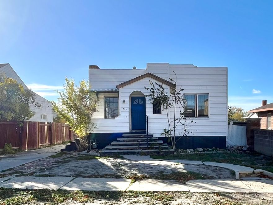 This charming cottage home in the heart of Price boasts ample natural light. Generous counter space in the kitchen with access to the deck via a sliding door.  The downstairs features a living area that can be used as a bedroom and plenty of storage space. Square footage figures are provided as a courtesy estimate only and were obtained from county records.  Buyer is advised to obtain an independent measurement.