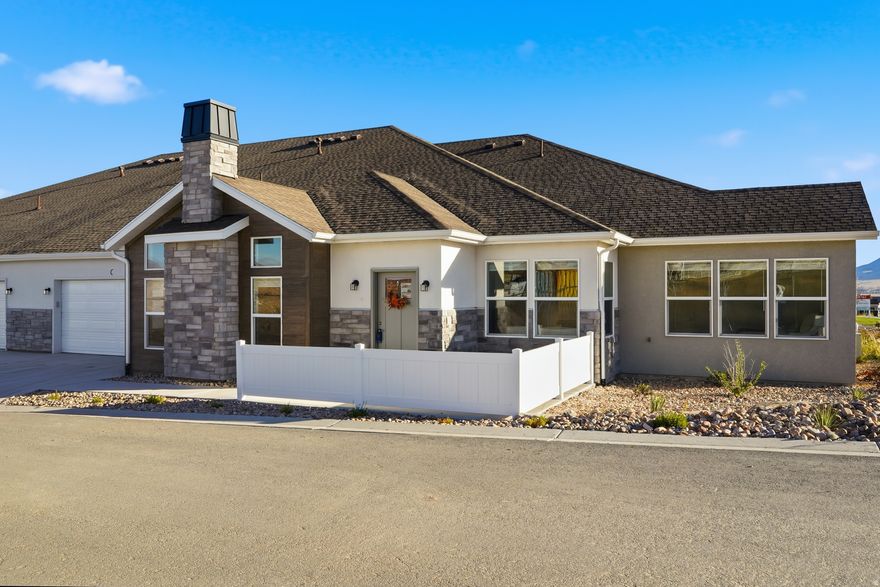 This thoughtfully designed 2-bedroom home offers the perfect balance of comfort, style, and convenience, ideal for those ready to simplify without sacrificing quality. Located in the heart of this vibrant city, the community offers easy access to shopping, dining, entertainment, and neighborhood amenities, making it easy to stay connected and active. This home will feature timeless, modern finishes including quartz countertops, tile backsplash, and stainless steel appliances. The open-concept floor plan with vaulted ceilings fills the space with natural light, creating an inviting setting for everyday living or hosting family and friends. Every detail is designed for low-maintenance living, giving you more time to enjoy what matters most. This is a wonderful opportunity to secure a brand-new home in a welcoming, active community that supports both independence and connection. Visit our model home, open Friday and Saturday from 123 PM, or call to schedule a private tour. Additional floor plans are available at a variety of price points. Seller is offering 1 year of prepaid HOA dues for any contract accepted before the end of March. See listing agent for details.