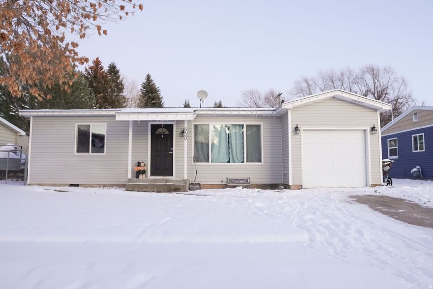 Step inside this charming 3-bedroom, 1-bath home and enjoy the fresh updates throughout. Updated paint, trim, and new flooring create a clean and inviting feel, while the functional floor plan offers comfortable living spaces. The updated kitchen features a bar that provides a welcoming gathering area and includes a new refrigerator, new dishwasher, stove, and microwave. Washer and dryer are included for added convenience. Additional amenities include a 1-car attached garage and a large fenced yard, offering space to relax or entertain. Located near local walking trails and amenities, this property may also offer potential as an investment opportunity. Come take a look, call the listing agent today!