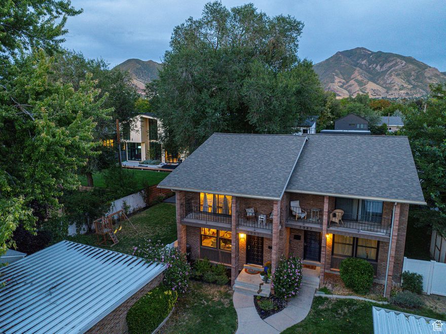 Tucked away in one of East Millcreek's most sought-after neighborhoods, this townhome is a "unicorn" find-offering unbeatable value for the location, unbelievable mountain views, and a lifestyle that blends nature, comfort, and accessibility. Just minutes from Millcreek Canyon, I-80, and 215, and within walking distance to dining, shopping, and parks, this location is the perfect balance of peaceful retreat and urban connection. Step inside to be welcomed by updated details that bring a fresh, contemporary feel to the kitchen, living room, and half bath. The layout flows into a rare townhome, private backyard oasis-ideal for entertaining, playing, or simply soaking in the Wasatch views.  Upstairs, two generously sized bedrooms offer ample closet space and quiet comfort. The primary bedroom features a walkout patio and sliding glass doors. Downstairs, a cozy family room sets the scene for movie nights and relaxed weekends. With a third bedroom and bathroom, the entire floor can double as a quiet home office or a private retreat for guests or teens. Recent upgrades include remodeled kitchen, New LVP & carpet, water heater, roof, lighting, paint, and 4x12 Tuff Shed.