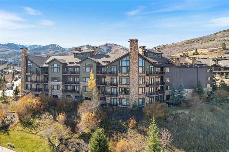 This luxury Waldorf Astoria condominium is set in the Canyons Village with direct access to skiing and snowboarding at Park City Mountain, the largest ski resort in the United States, and golfing at The Canyons Golf Course. You'll feel taken care of and pampered with the dedicated gondola, outdoor pool, spas, salons, fitness classes, personal trainers, steam rooms, restaurants, valets, and more. There is a gourmet kitchen with Viking appliances, a living room with a gas fireplace, dining area, bar seating, and a private deck. Two primary bedroom suites have their own fireplaces, jetted tubs, separate showers, and views from the large windows. Enjoy the nine-foot + ceilings, stone tile flooring, granite counters, and the heated garage. This condo has a lock-out unit, which results in higher rental revenue. Square footage figures are provided as a courtesy estimate only and were obtained from county records. Buyer is advised to obtain an independent measurement.